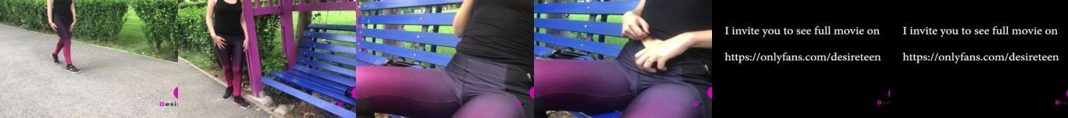Horny student masturbating in a public park through yoga pants with people around